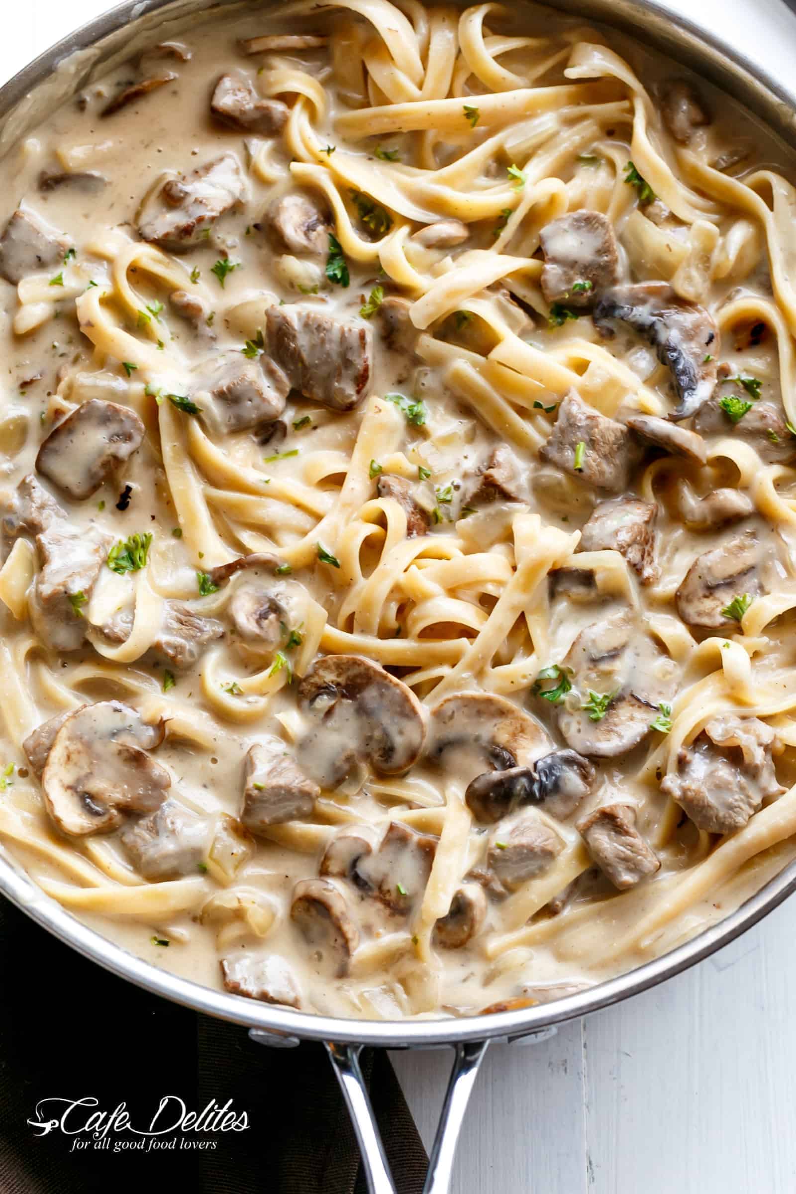 Creamy Beef and Mushroom Stroganoff is ready and on the table in less than 20 minutes! Your family will go crazy thinking there's a hidden chef in your kitchen! | cafedelites.com