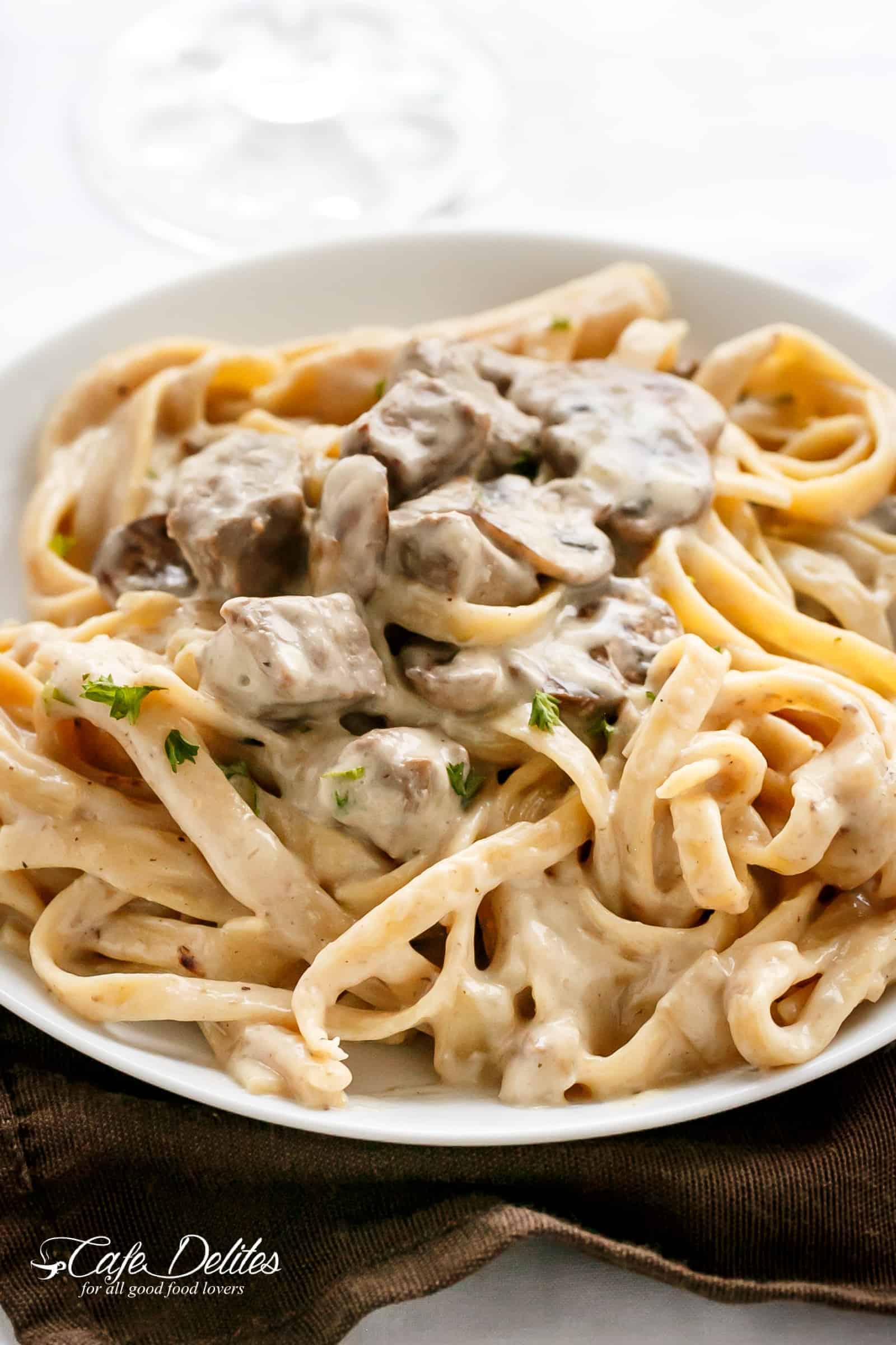 Creamy Beef and Mushroom Stroganoff served over pasta OR noodles! | cafedelites.com