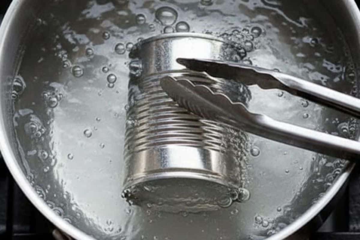 Bring water to a boil, then reduce heat to low and let it simmer for 2½ to 3 hours, or longer for a deeper caramel. - 4