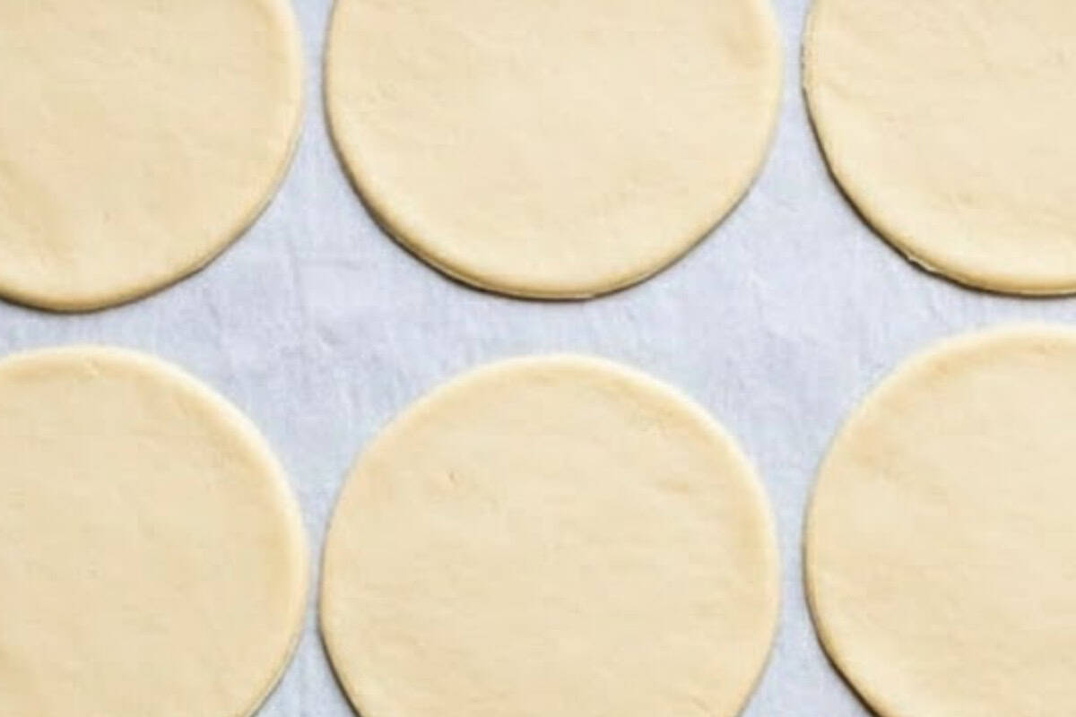 Preheat the oven to 176°C (350°F). Cut four circles from each pastry sheet using a 12 cm (4-inch) cutter - 6