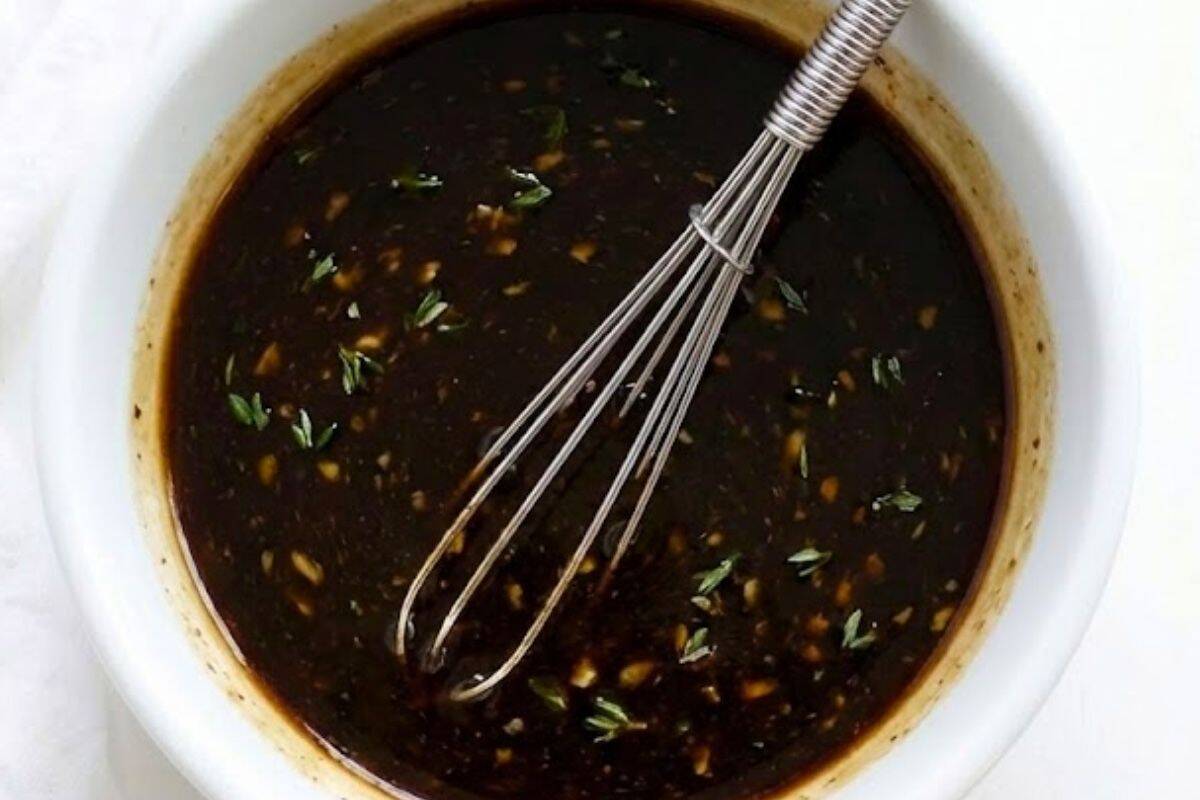 Stir the balsamic glaze, water, garlic, thyme, and salt together until smooth - 5