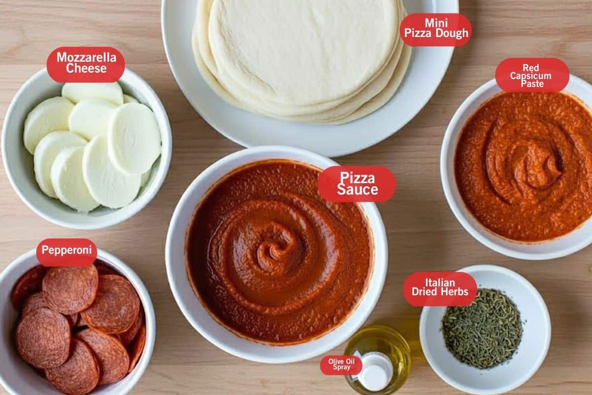 Flat lay photo of ingredient shot of mozzarella cheese slices, mini pizza dough, red capsicum paste, pizza sauce, pepperoni, Italian dried herbs, olive oil spray - 2