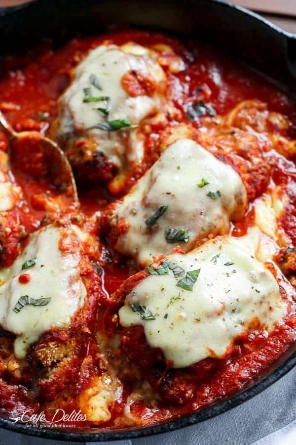 One Pan Mozzarella Stuffed Chicken Parmesan | https://cafedelites.com