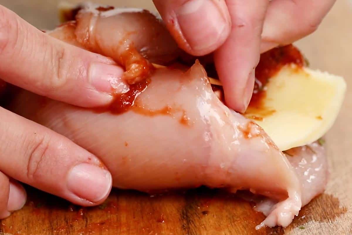 Securing the stuff in the fillet with a toothpick. - 5