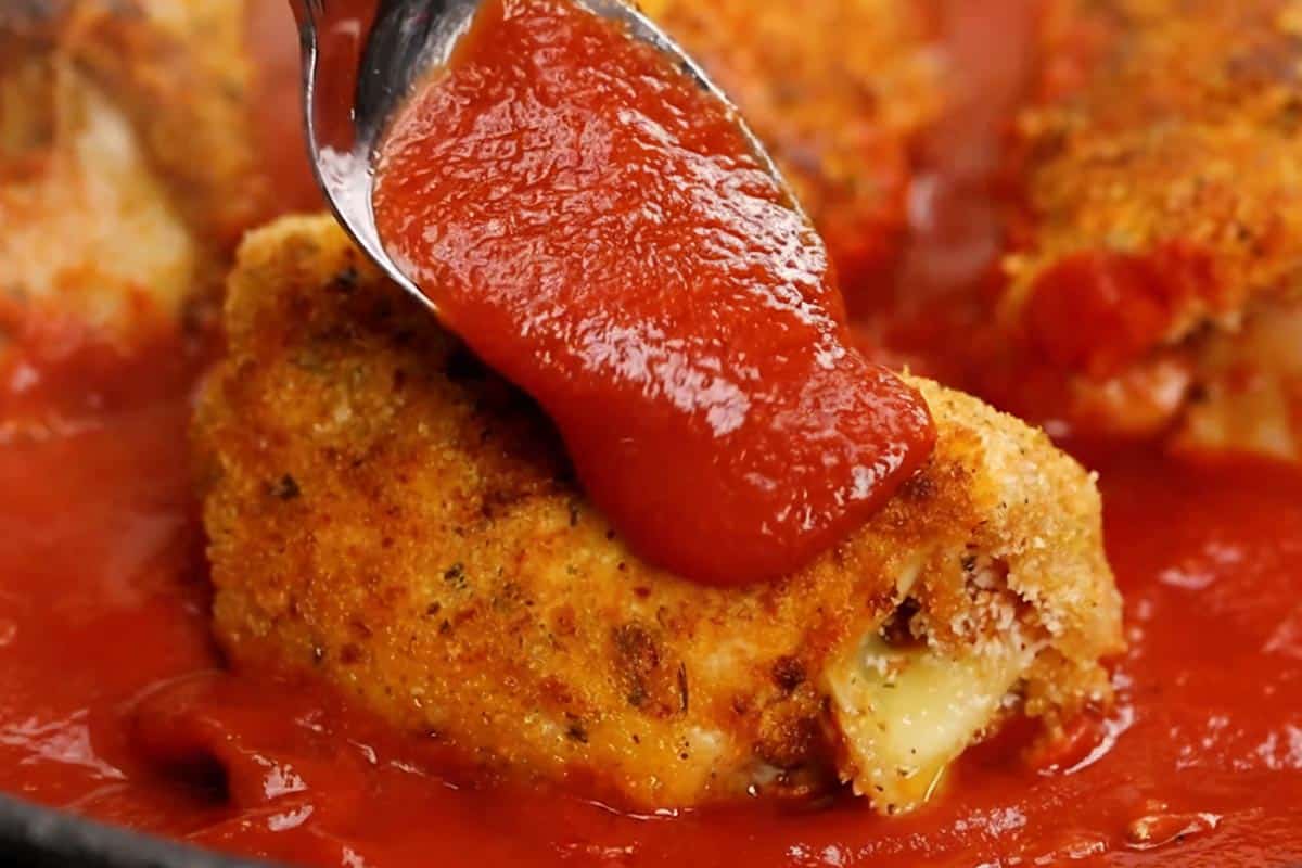 Adding the marinara sauce. - 9