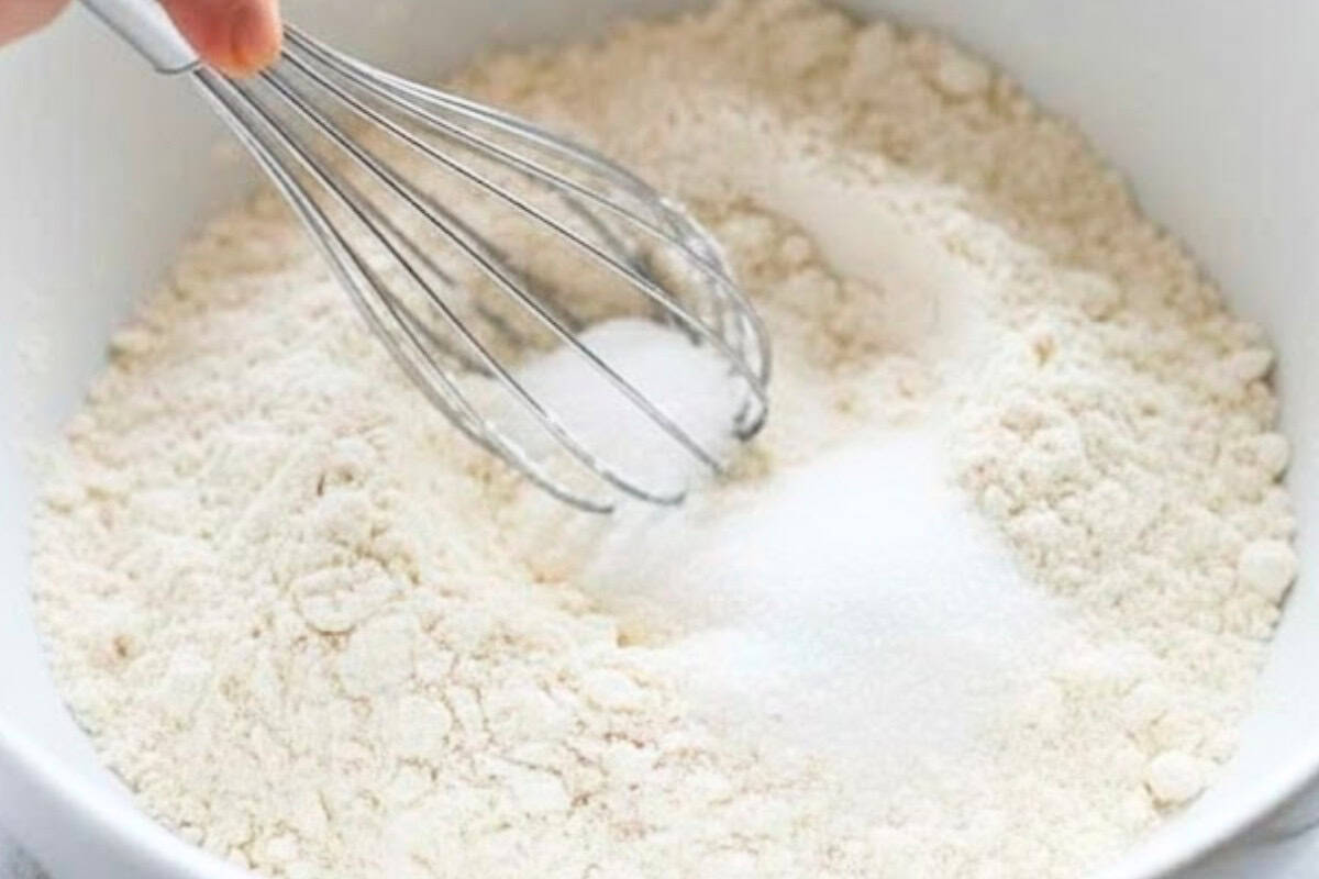 In a large bowl, whisk together flour, sugar, baking powder, baking soda, and salt  - 5