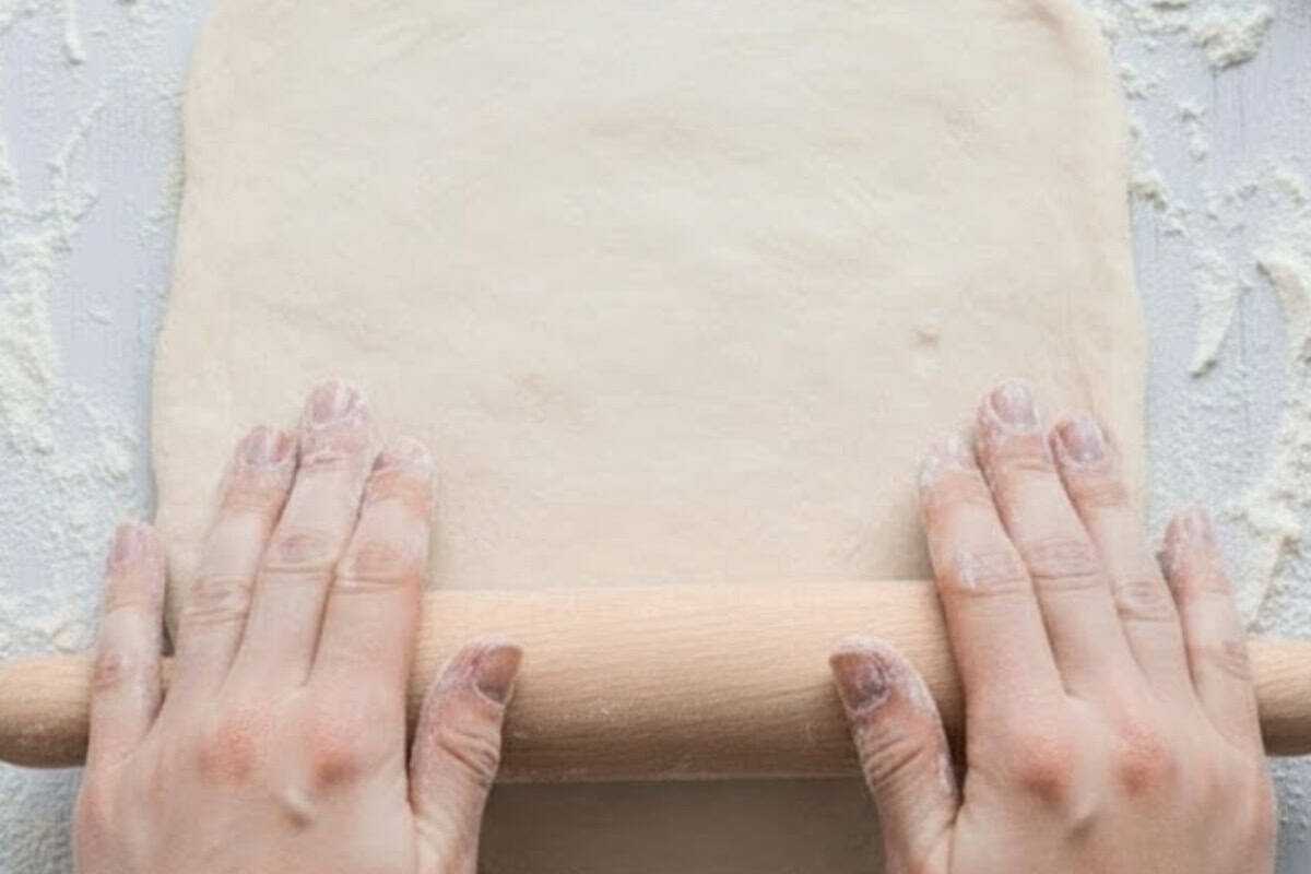 Turn the dough out onto a lightly floured surface and shape or roll it into a 13×10-inch rectangle. - 7