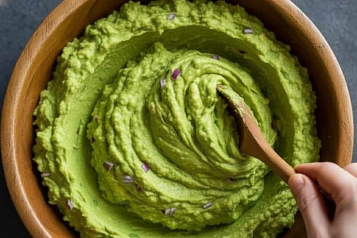 Scoop avocado into a bowl, add lemon and lime juice, red onion, chives, jalapeño, salt, and pepper, then mash until creamy - 8