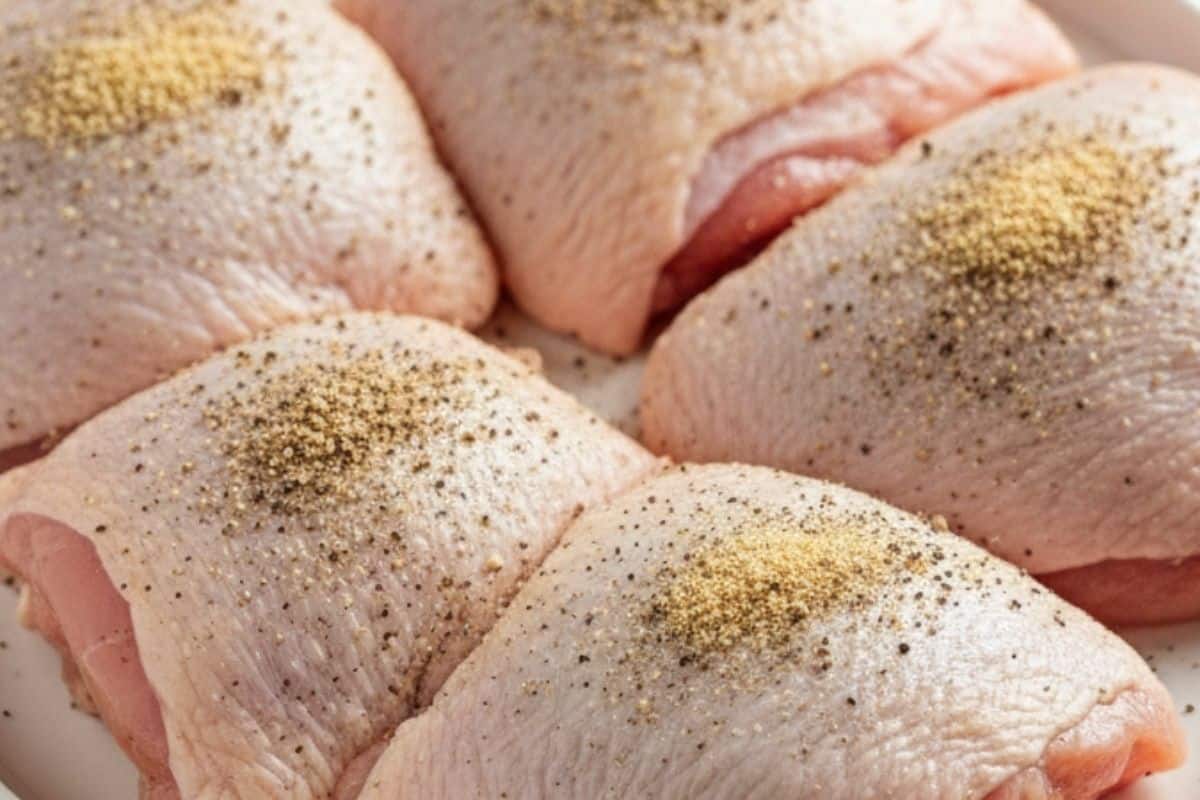 Pat chicken dry, then season all over with salt, pepper, and garlic powder.