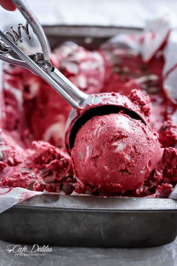 Red Velvet Cookie Dough Frozen Yogurt with a Vanilla Bean Cream Cheese Swirl | https://cafedelites.com
