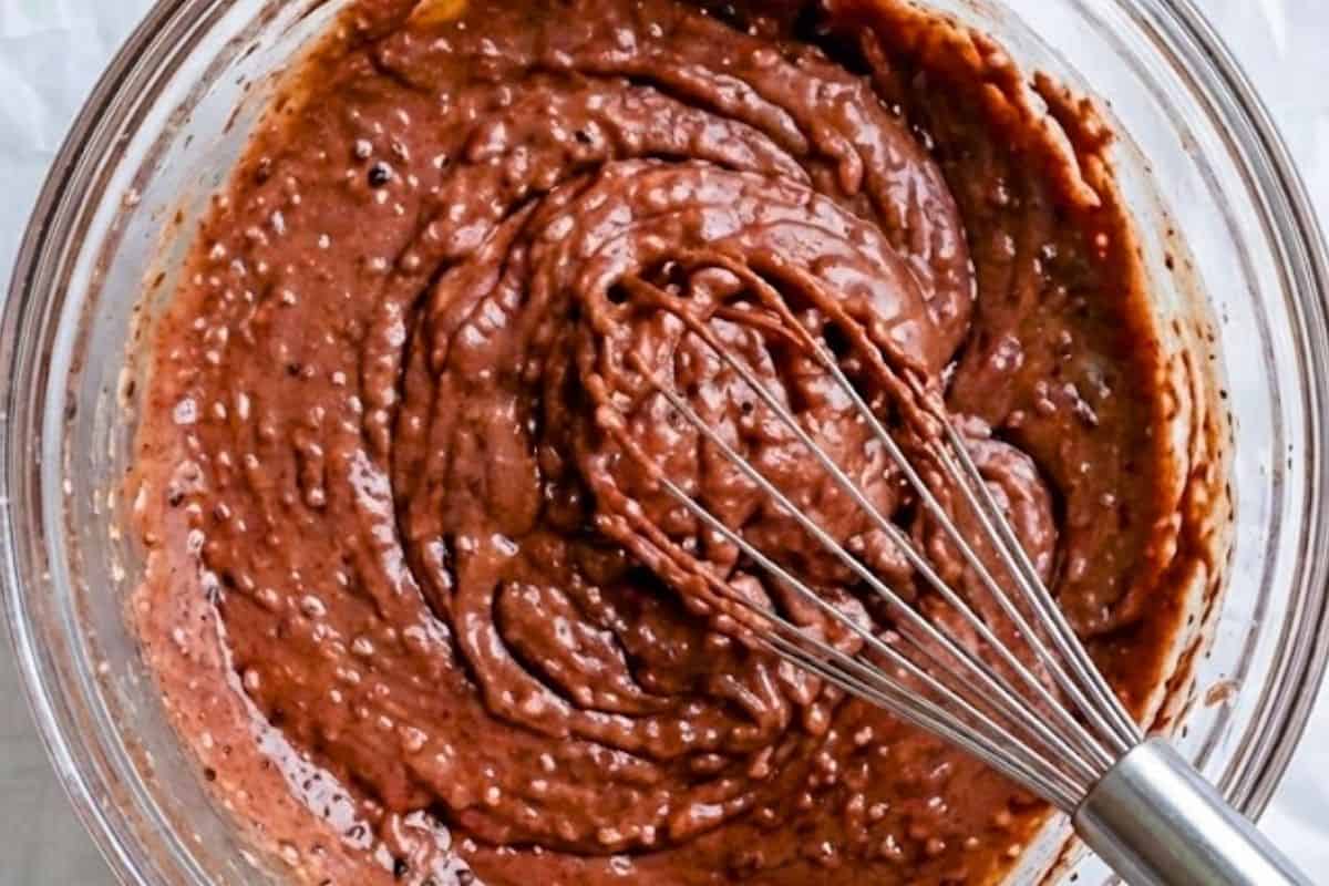 Whisk the melted butter and both sugars until creamy, then add the flour, cocoa, and salt