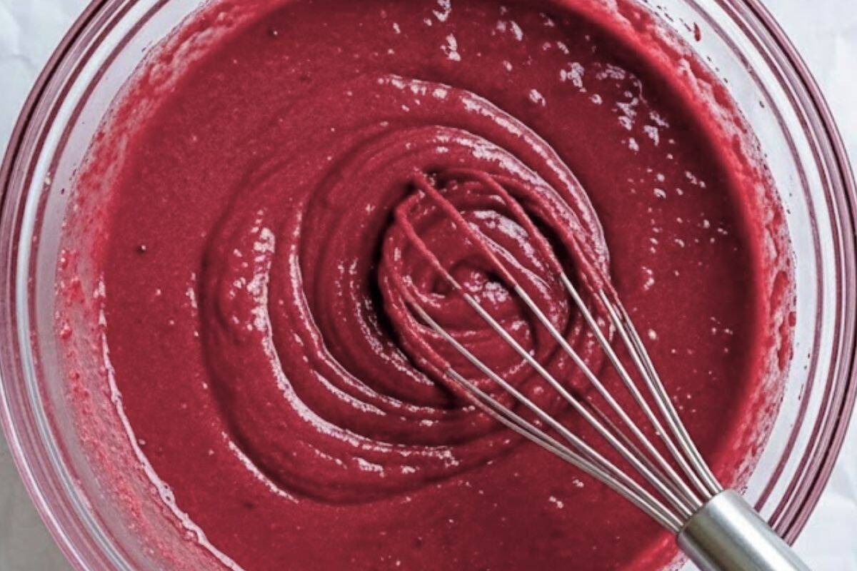 Blend in the cream cheese, then the yogurt and red coloring