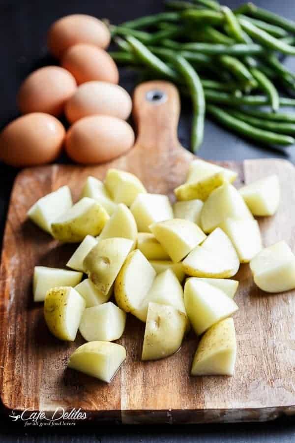 Potato, Egg and Green Bean Salad with a Garlic Infused Lemon Dressing | https://cafedelites.com