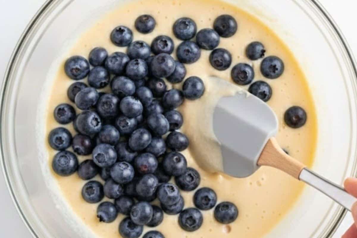 Gently fold the blueberries through the batter, - 6