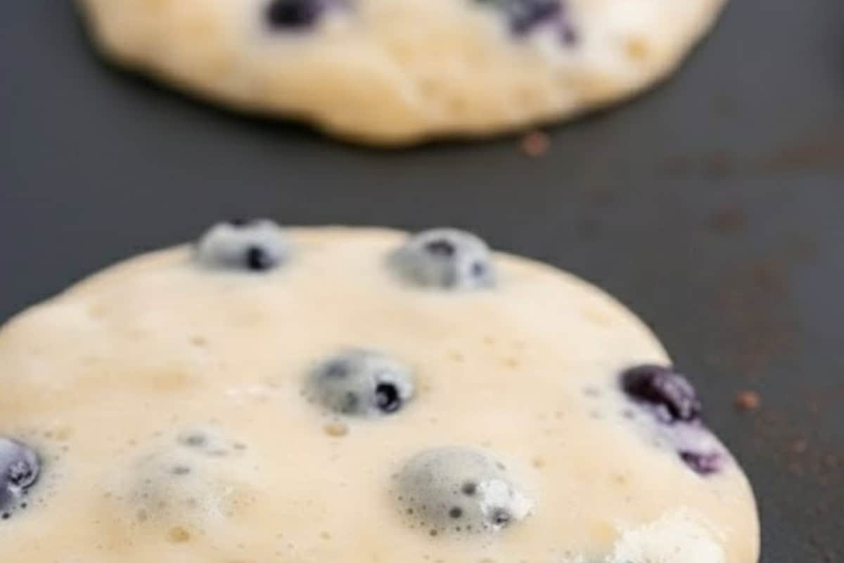 Pour about 1/4 cup of batter onto the pan for each pancake. Cook until bubbles form on the surface and the underside is golden and set. - 8