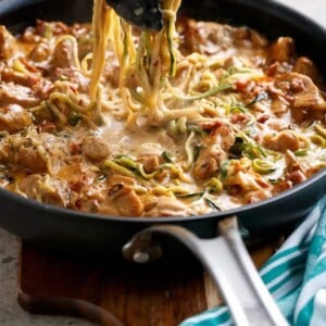 Creamy Sundried Tomato + Parmesan Chicken Zoodles in a pan