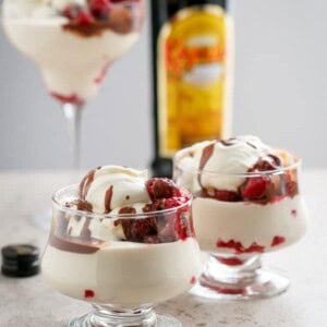Creamy Kahlua Raspberry Cheesecake Parfaits in a cup