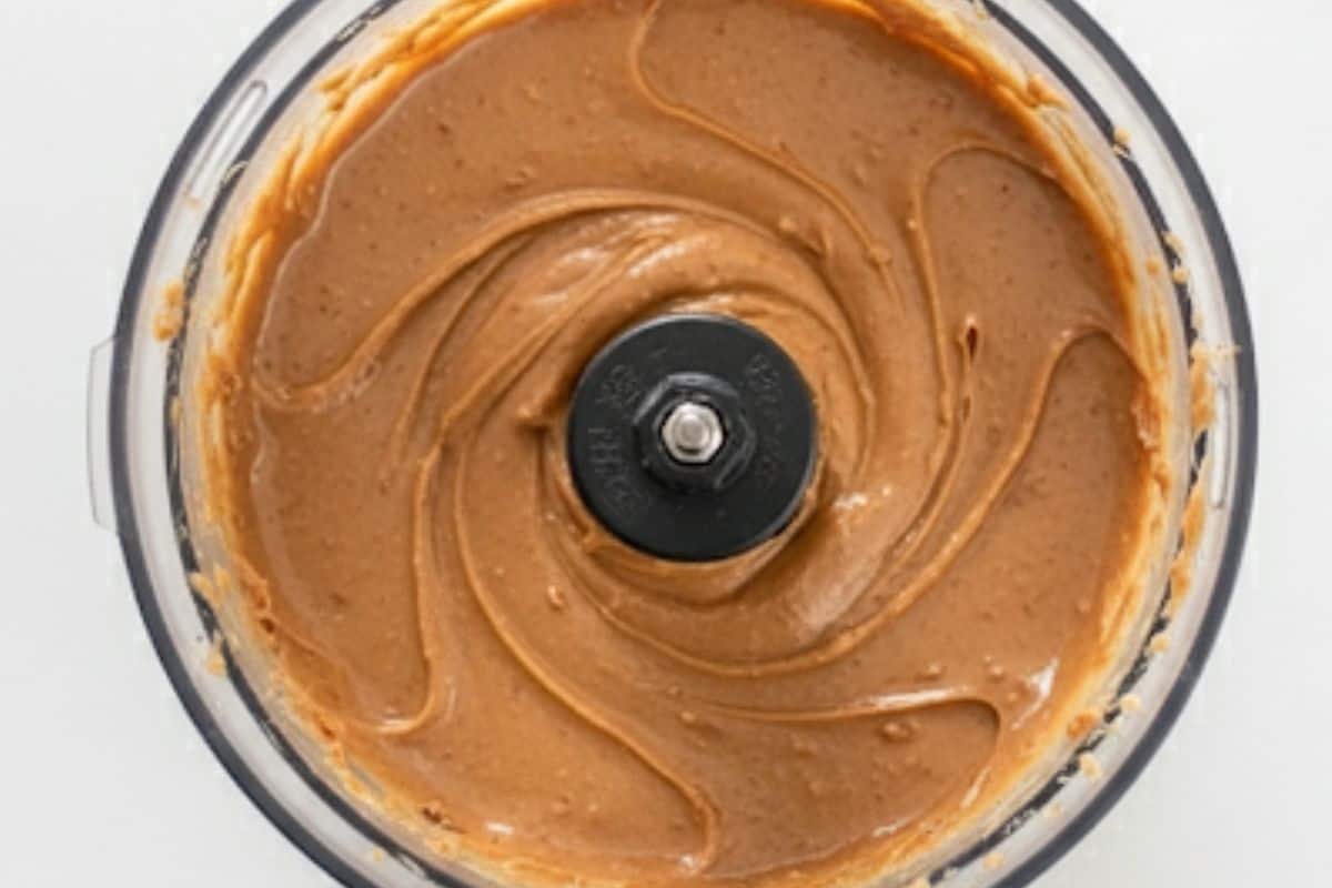 Pulse and blend the nuts turning it into a smooth hazelnut butter.