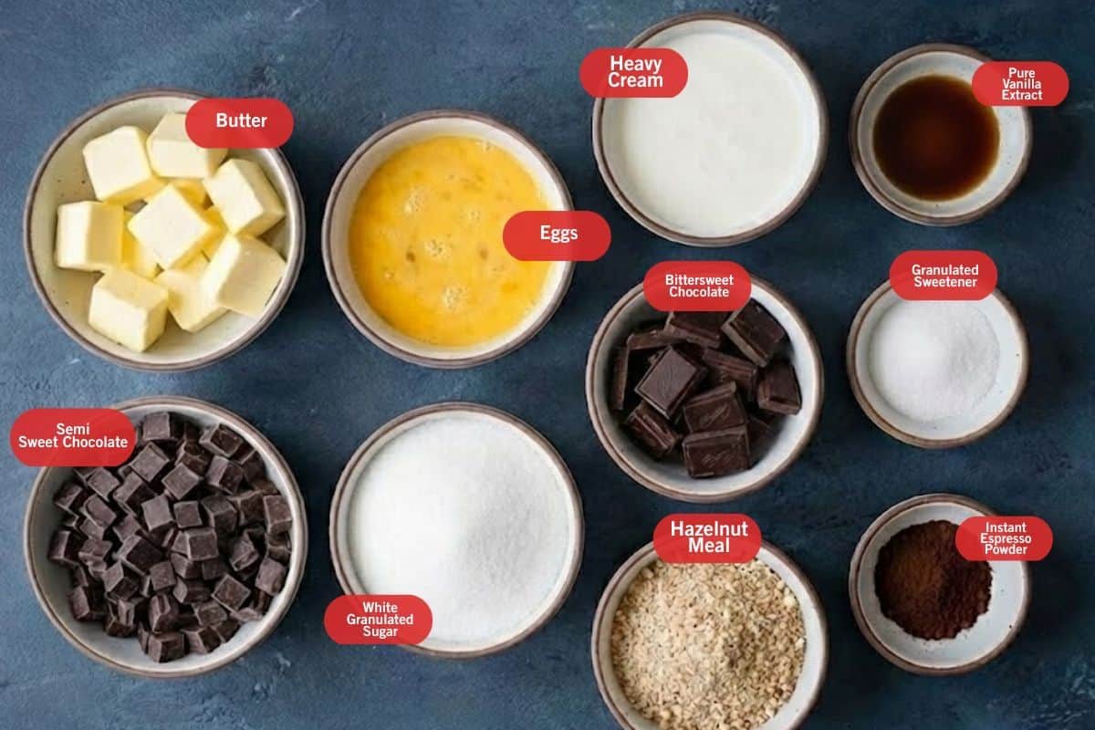 Flat lay photo of ingredient shot of Fudgy Flourless Hazelnut Brownies (Low Carb) 
(butter, eggs, heavy cream, pure vanilla extract, granulated sweetener, instant espresso powder, bittersweet chocolate, hazelnut meal, white granulated sugar, semi sweet chocolate) - 2