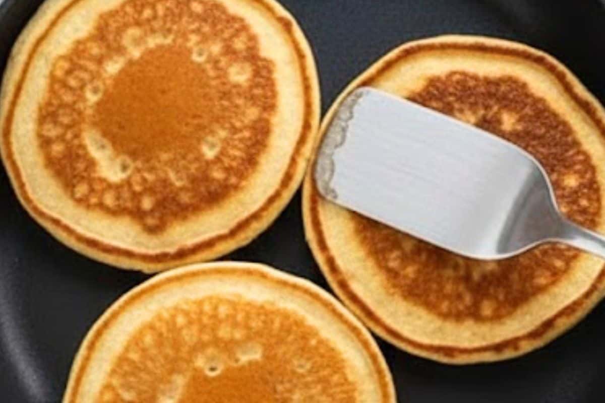 Allow each pancake to cook until bubbles form on top, then flip and cook the other side until golden.