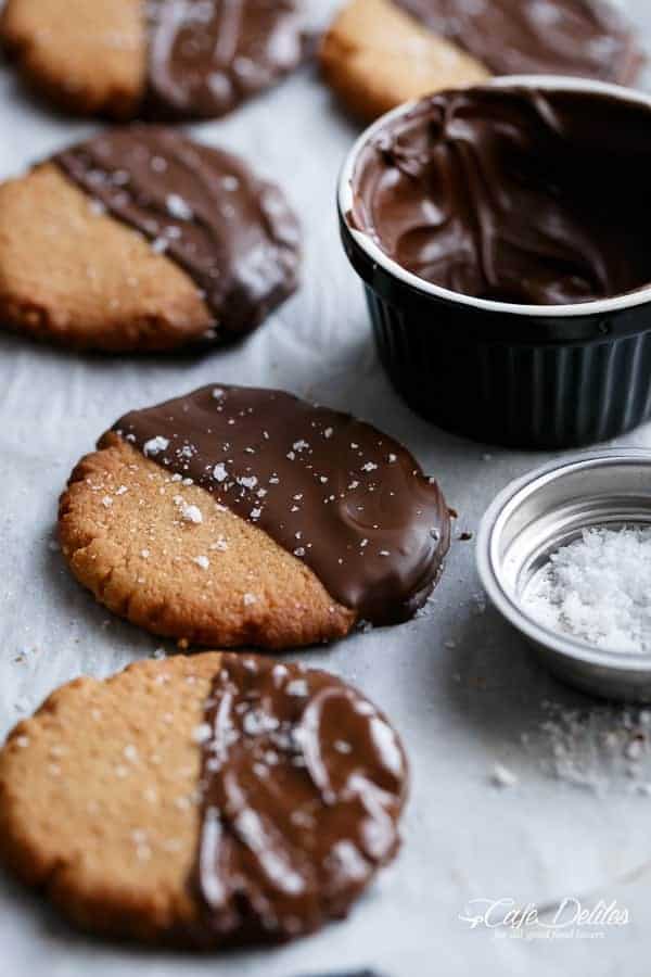 Salted Chocolate Dipped Peanut Butter Cookies | https://cafedelites.com