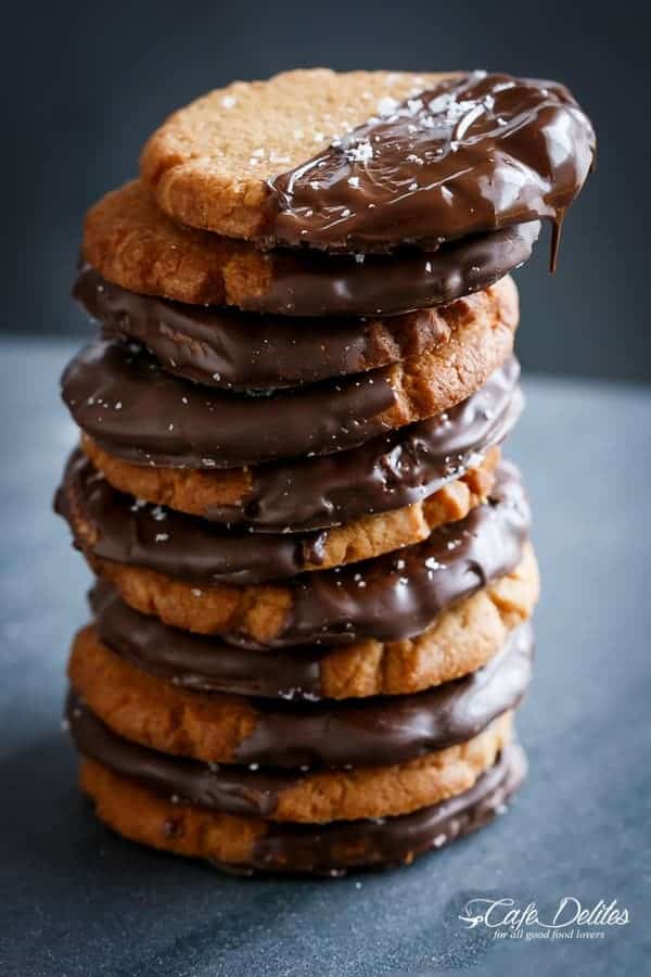 Salted Chocolate Dipped Peanut Butter Cookies | https://cafedelites.com