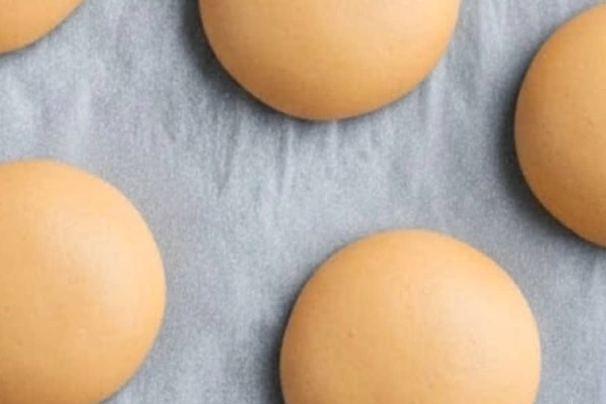 Scoop about one tablespoon of dough for each cookie, roll it into a ball, and gently flatten with your palm or the back of a fork. - 5