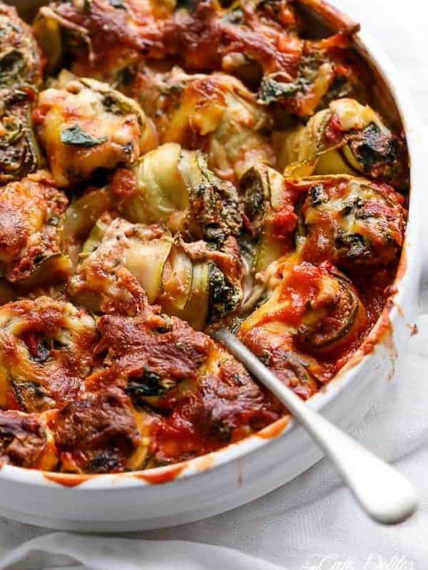 Spinach and Ricotta Zucchini Cannelloni with spoon in a bowl