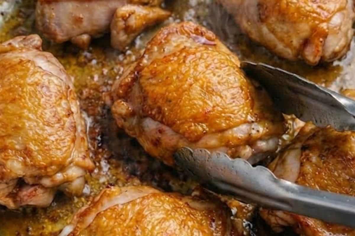 Heat a large ovenproof skillet over medium-high heat and cook the thighs