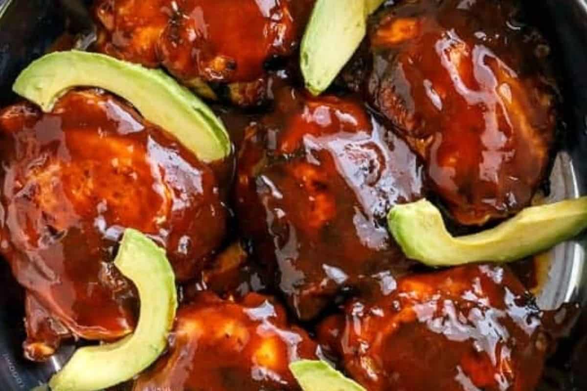 Spoon the reserved sauce evenly over the hot Buffalo Chicken Thighs