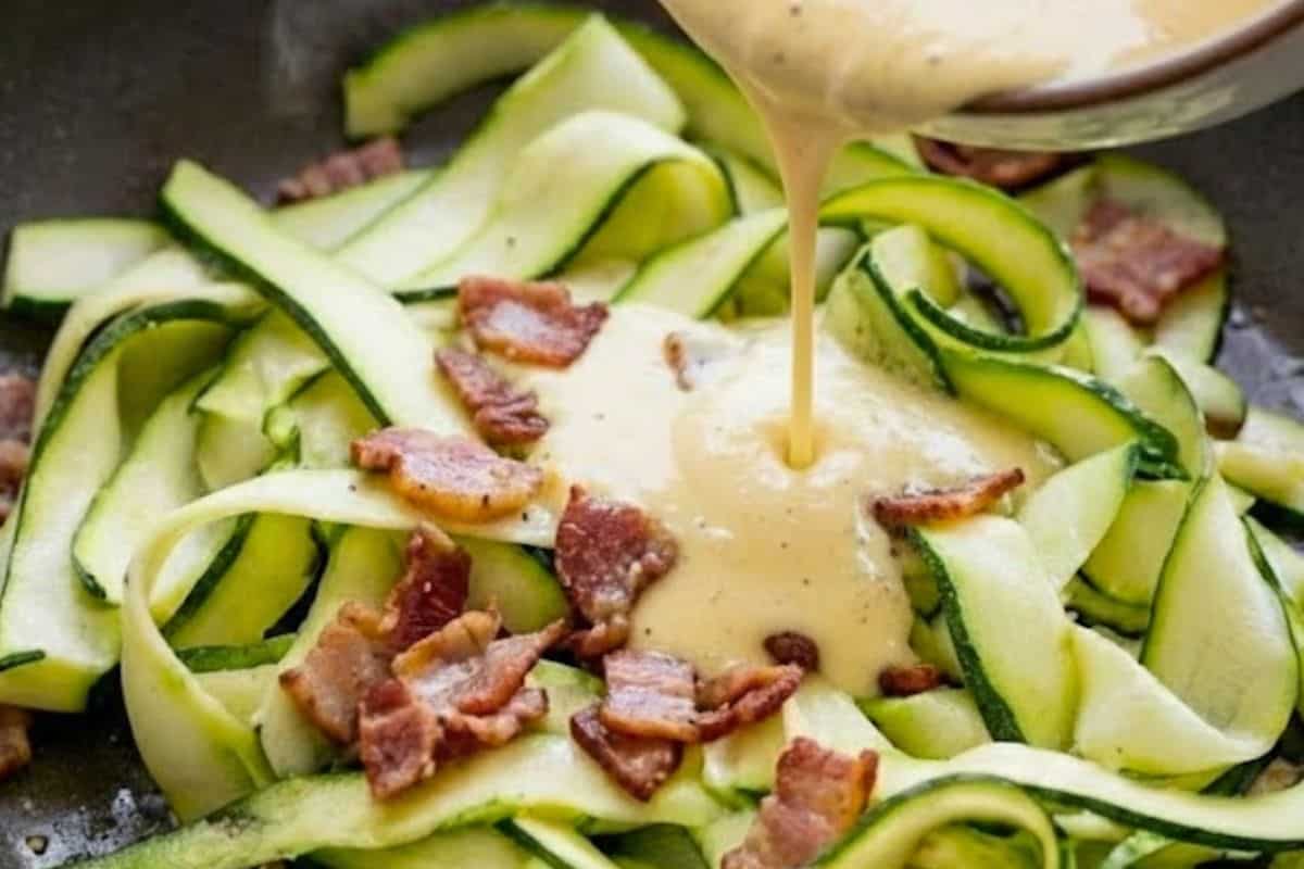 Slowly pour the egg mixture into the pan while stirring continuously. - 9