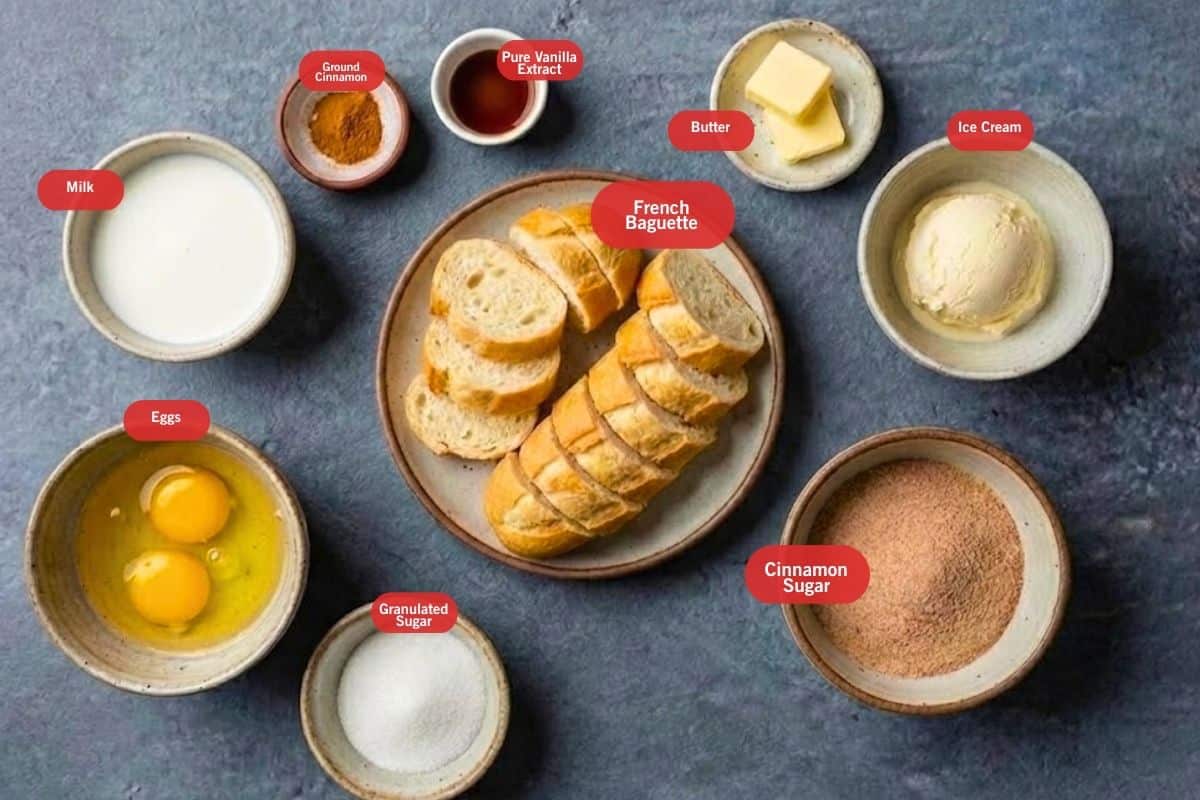 Flat lay photo of ingredient shot of milk, cinnamon sugar, granulated sugar, eggs, French baguette, ice cream, butter, pure vanilla extract, ground cinnamon, milk