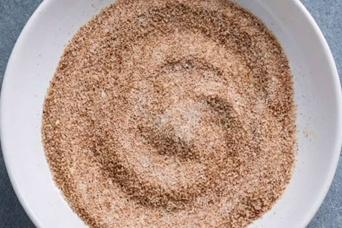In a separate shallow bowl, combine the sugar and cinnamon for coating.