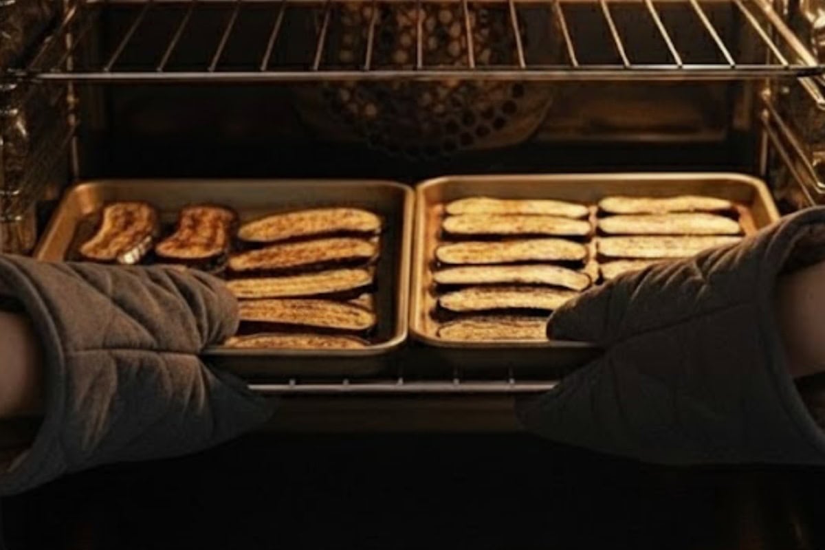 Roast for 20 minutes, turning once halfway through, until the eggplant is tender and lightly golden.