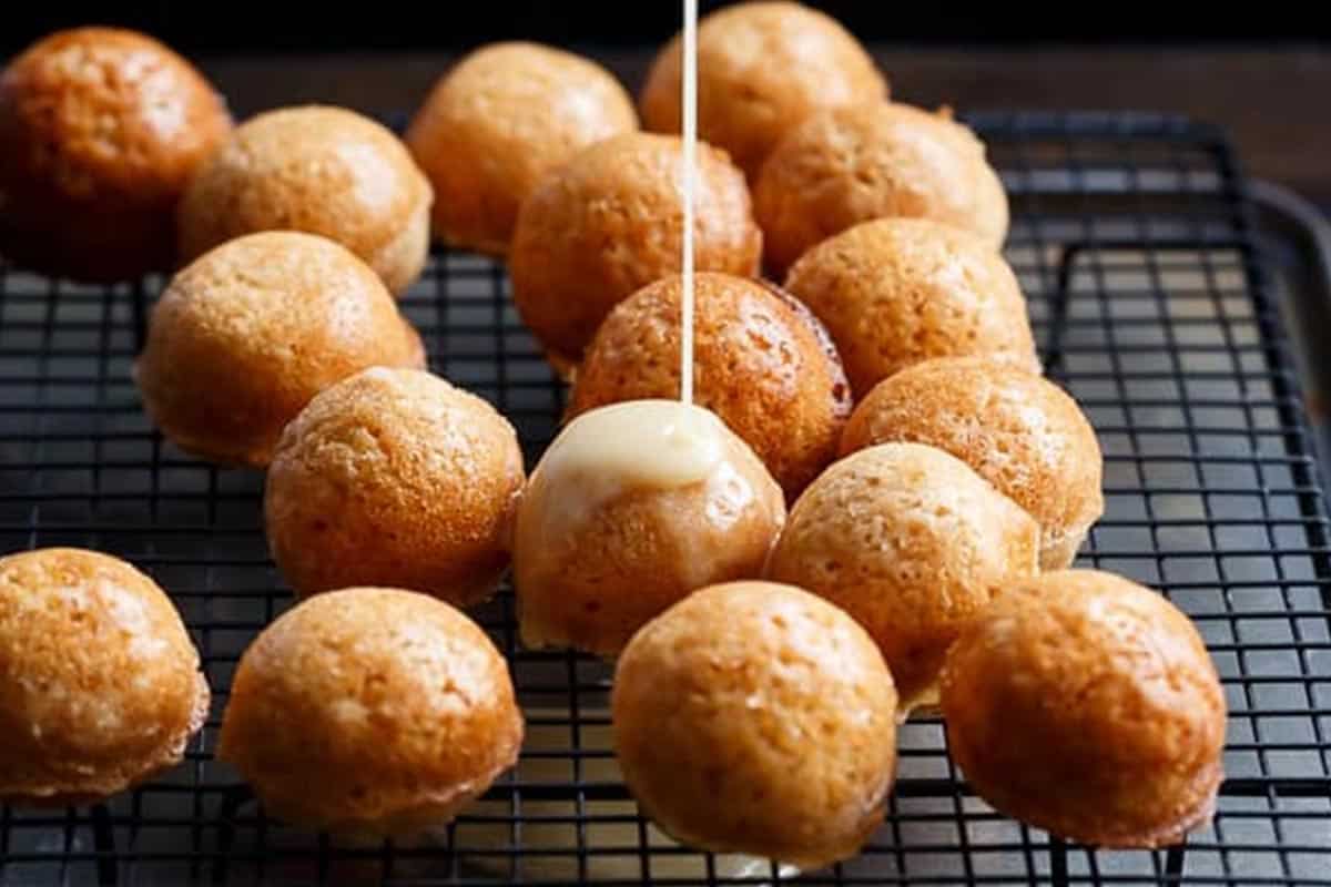 Close-up shot of Maple Glazed Apple Fritter Donut Holes.