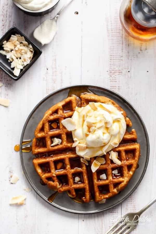  Crispy coconut waffles topped with whipped coconut cream and toasted coconut flakes  Coconut Cream Pie Waffles