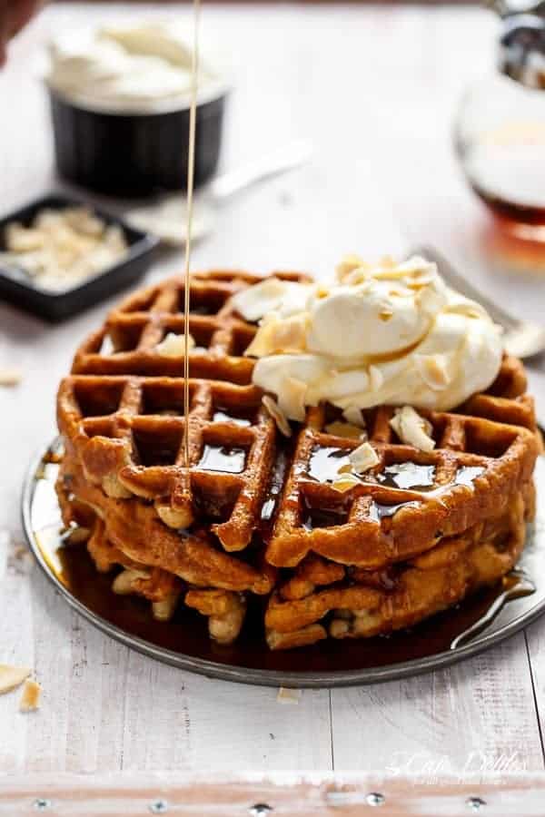  Crispy coconut waffles topped with whipped coconut cream and toasted coconut flakes  Coconut Cream Pie Waffles