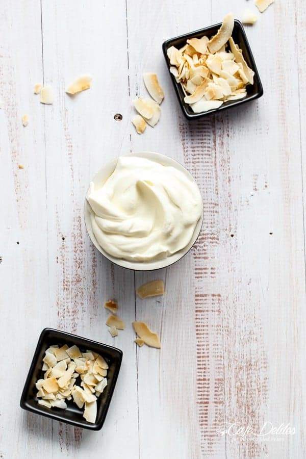  Crispy coconut waffles topped with whipped coconut cream and toasted coconut flakes  Coconut Cream Pie Waffles