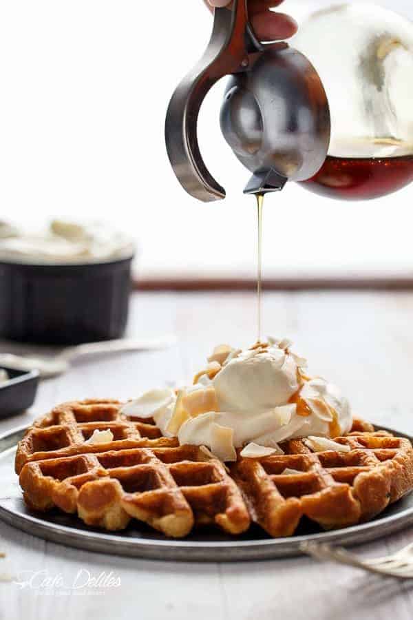  Crispy coconut waffles topped with whipped coconut cream and toasted coconut flakes  Coconut Cream Pie Waffles