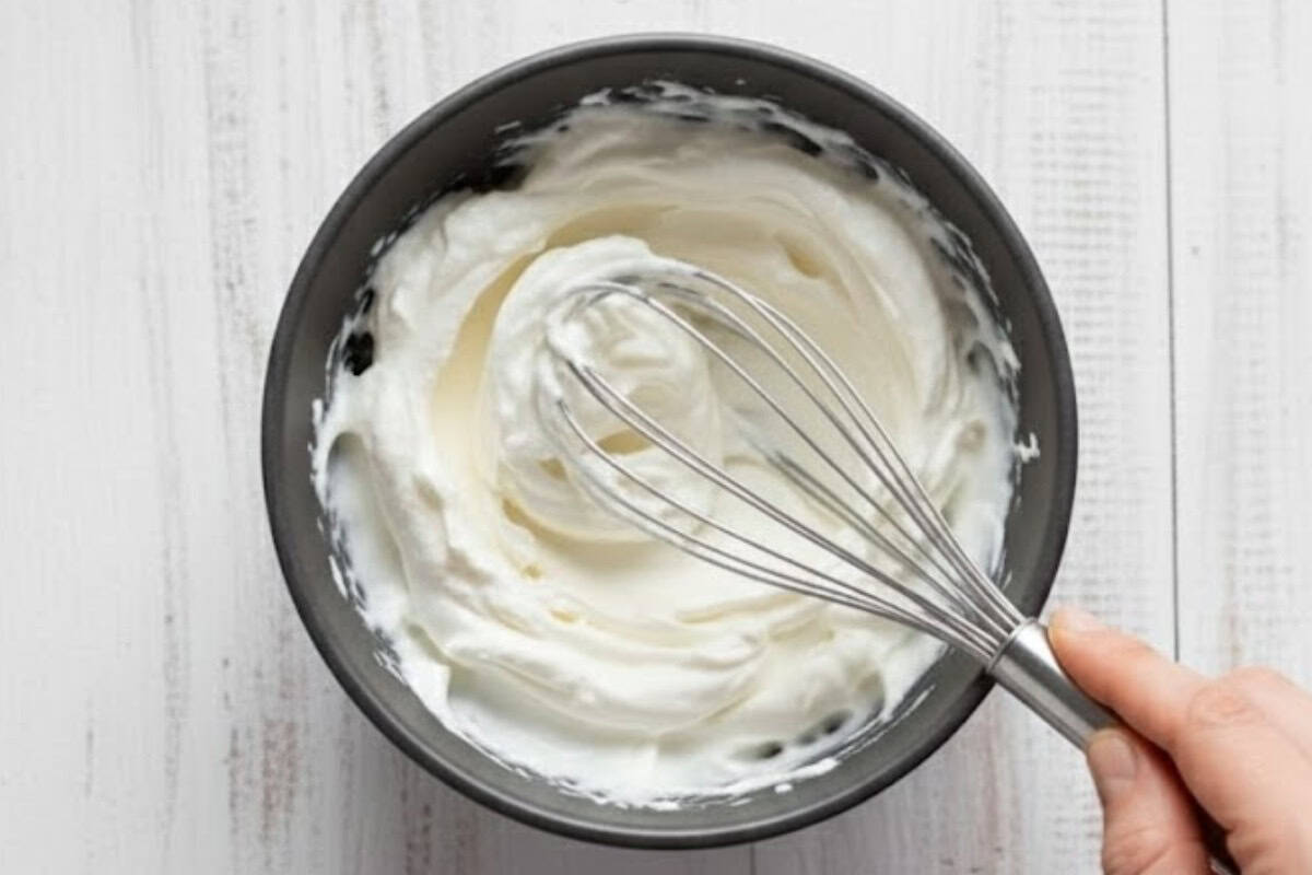 Whip your coconut cream while the waffles cook.