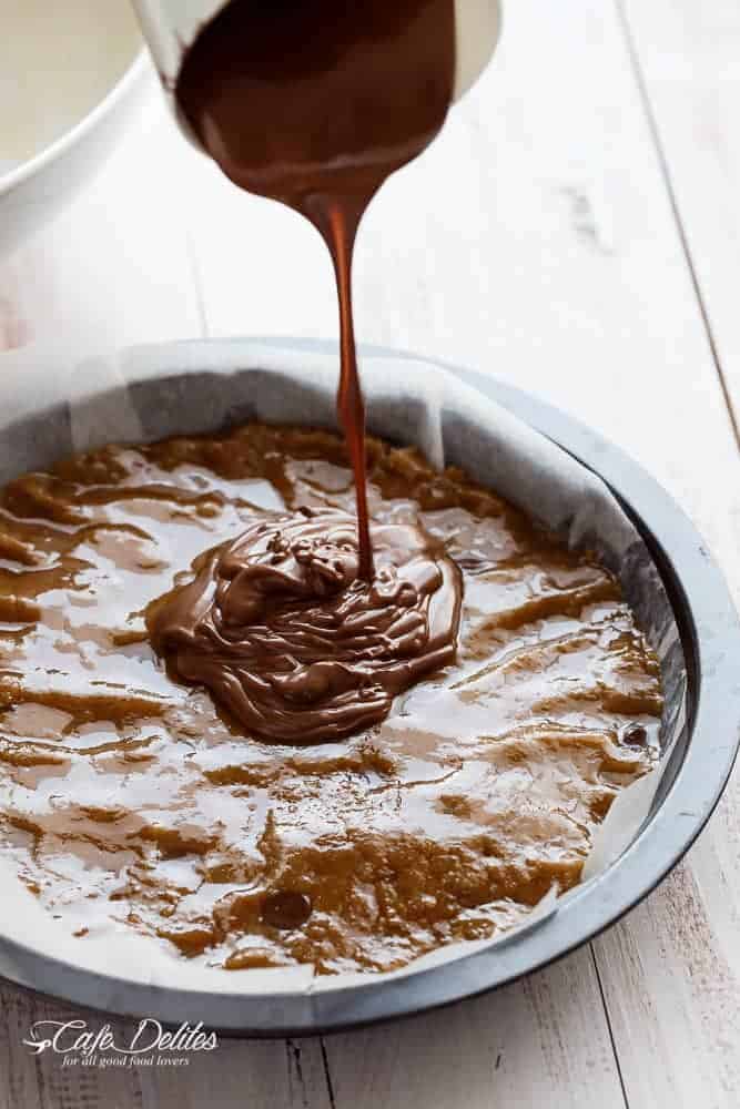 Nutella Stuffed Browned Butter Gingerbread Skillet Cookie | https://cafedelites.com