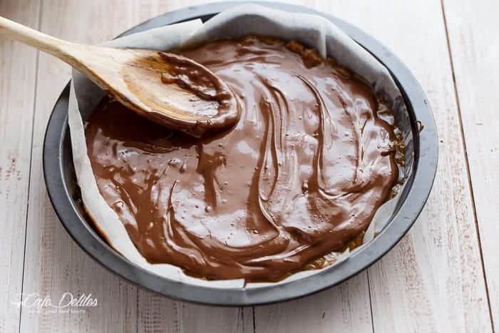 Nutella Stuffed Browned Butter Gingerbread Skillet Cookie | https://cafedelites.com