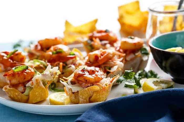 The ultimate appetiser! Garlic Prawn (Shrimp) Salad Wonton Cups with Sweet Chilli Sauce | https://cafedelites.com