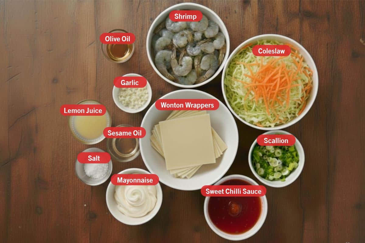 Top shot of ingredients: olive oil, shrimp, coleslaw, garlic, lemon juice, sesame oil, salt, mayonnaise, wonton wrappers, scallion, sweet chilli sauce. - 2