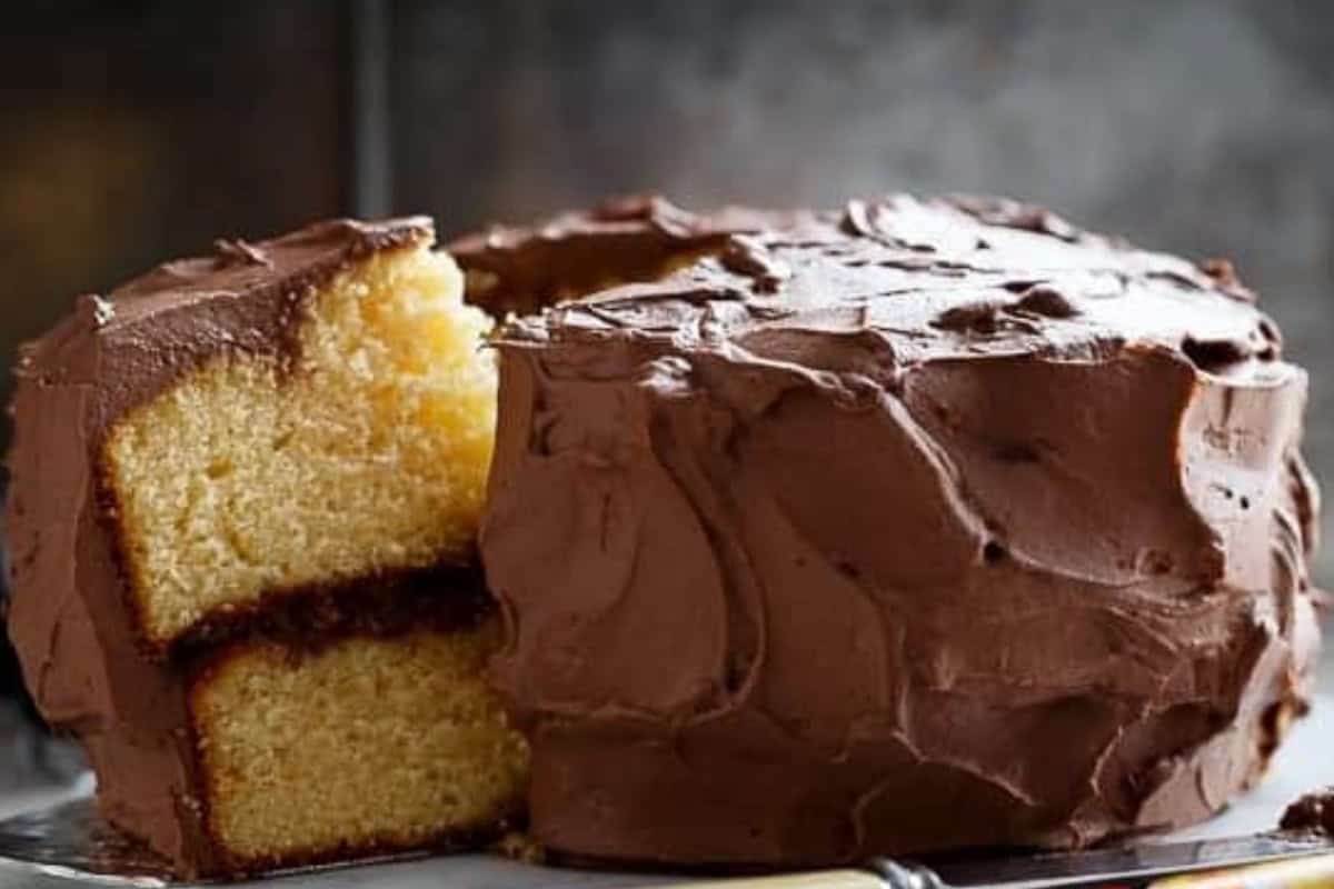 Whip frosting ingredients to stiff peaks, spread between layers, then cover the top and sides - 10