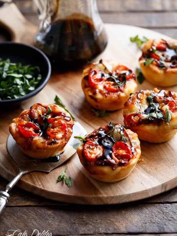 Caprese salad meets pizza in these delicious deep dish pizzas made easy in a humble standard muffin pan
