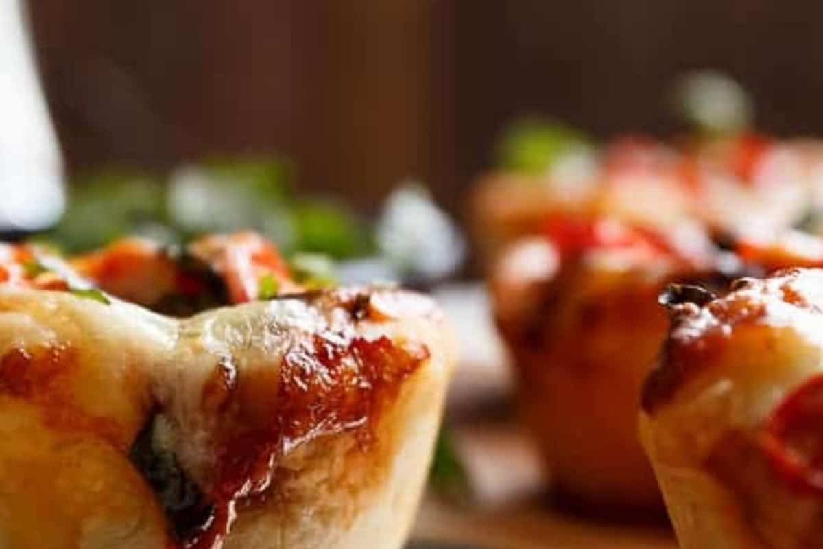 Sprinkle a little shredded mozzarella on top, add a small drizzle of balsamic glaze, and bake for 12 to 15 minutes 