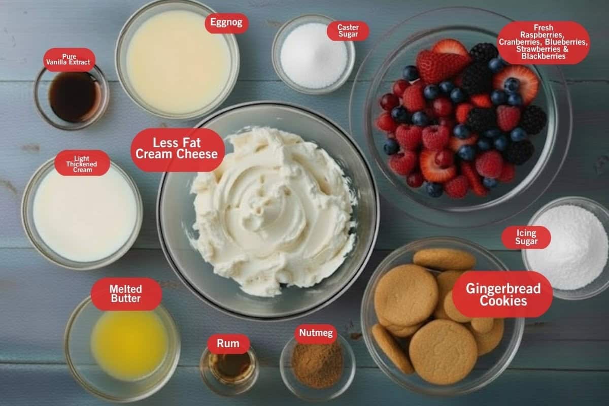 Flat lay photo of ingredient shot of less fat cream cheese, eggnog, light thickened cream, pure vanilla extract, caster sugar, fresh mix fruits, icing sugar, ginger bread cookies, nutmeg, rum, melted butter