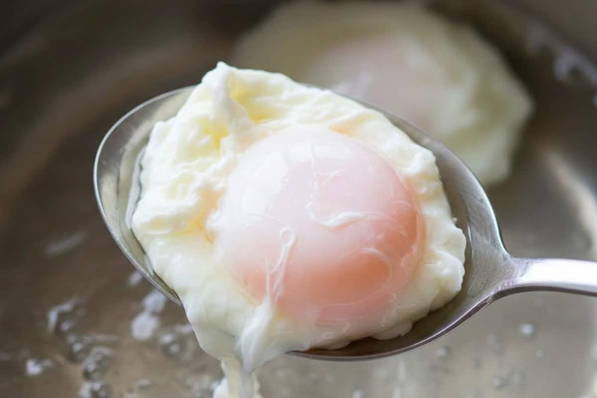Poach the eggs to your liking in gently simmering water. - 8