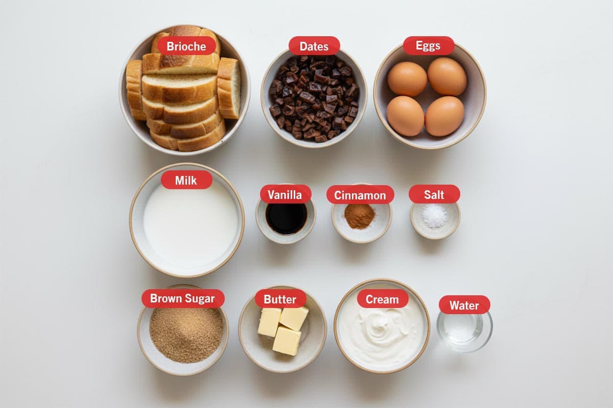 Top shot of ingredients: brioche, dates, eggs, milk, vanilla, cinnamon, salt, brown sugar, butter, cream, and water. - 2